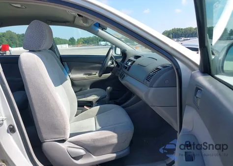 2002 Toyota Camry Le from USA, damaged, VIN 4T1BE32K72U117477